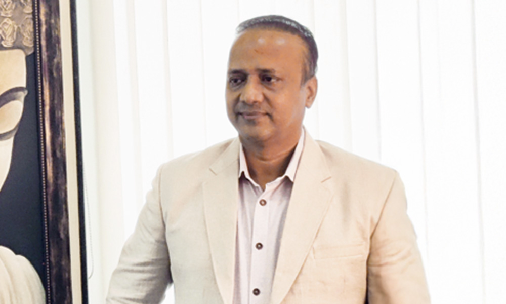 Formal business portrait of a man in a suit.